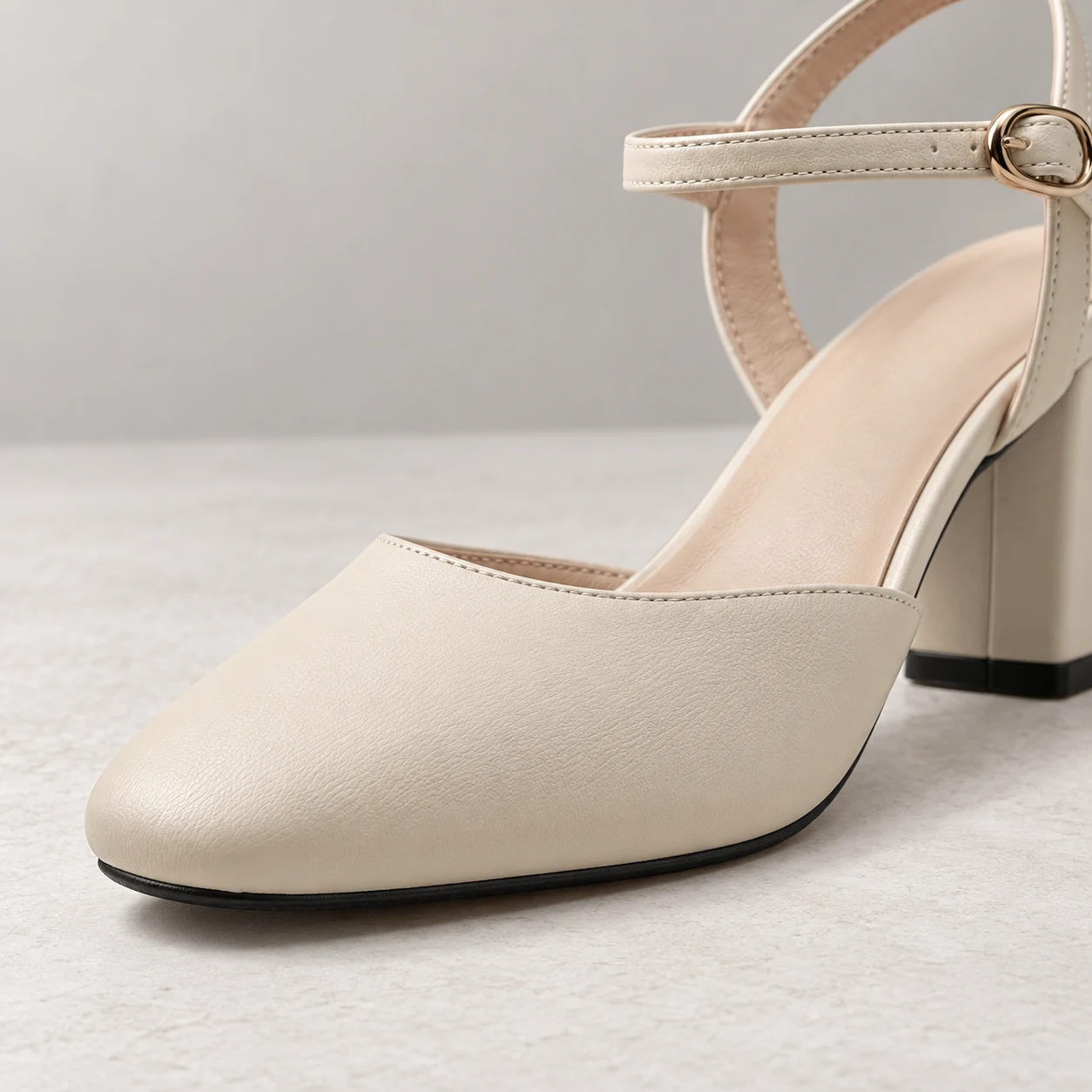 Ivory slingback block heel shoes for women in US size 4 on a white background