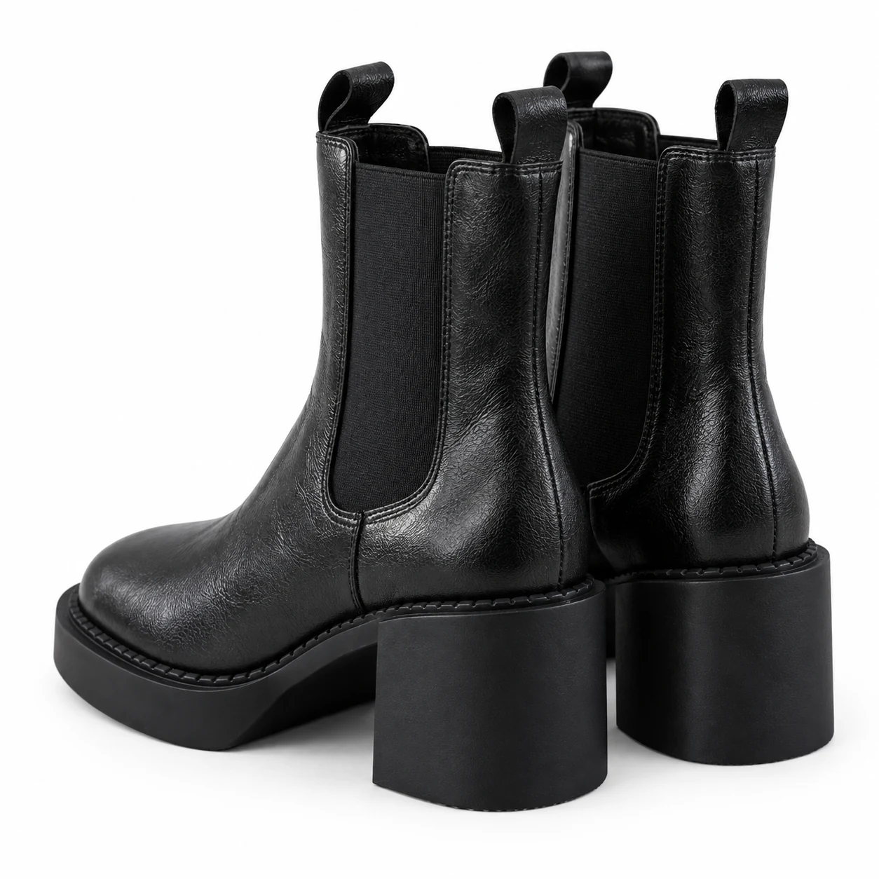 Rear detail of Black Short Chelsea boots with elastic panels, pull loops and block heels